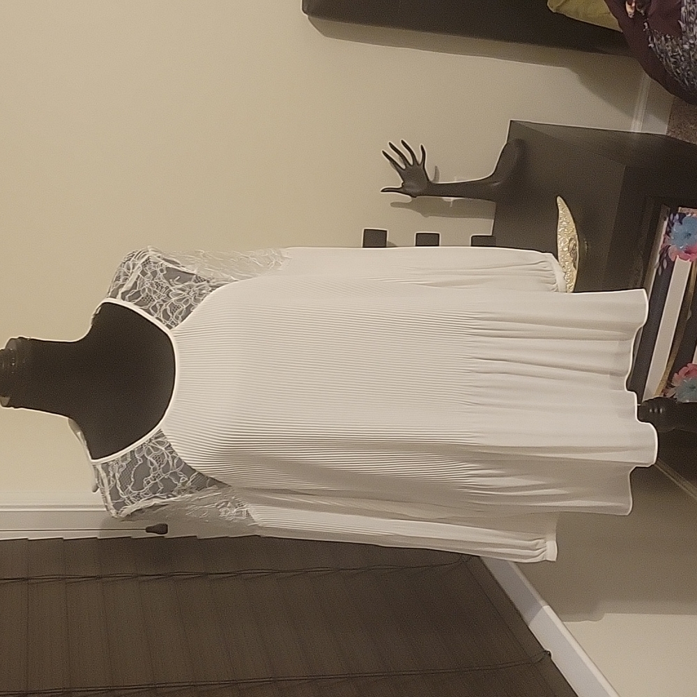 White pleated blouse, lined with lace detail
